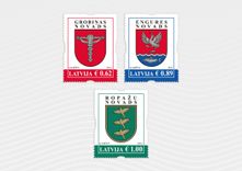 Uz Latvijas Pasta gada pirmajām pastmarkām – Engures, Grobiņas un Ropažu novada ģerboņi